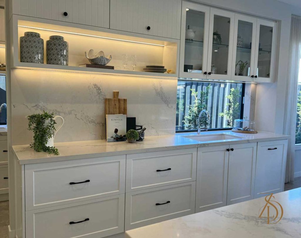 Kitchen pull-out pantry with labeled storage and easy access shelving